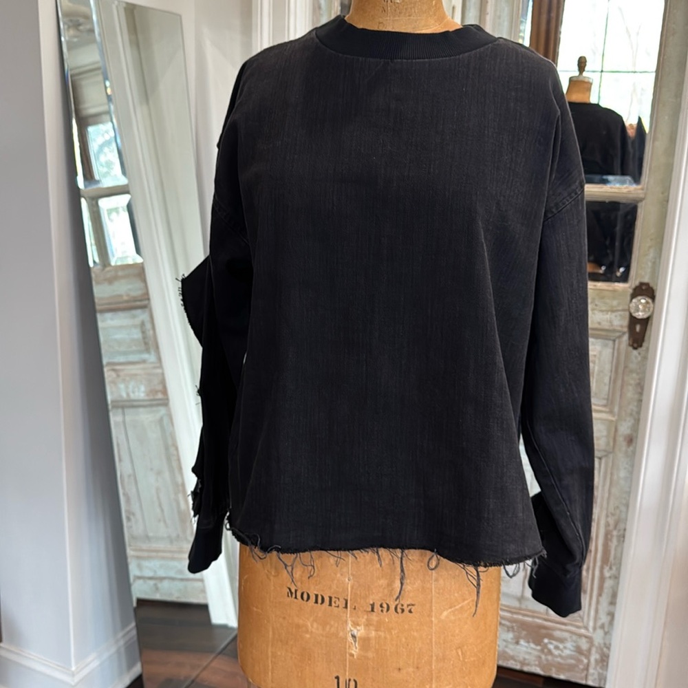 Zara NWOT. Black denim top with ruffles and raw hem.